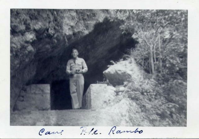 Rambo at entrance of cave